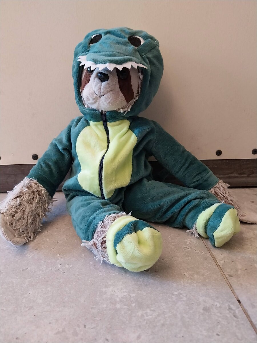 Corn in a dinosaur costume